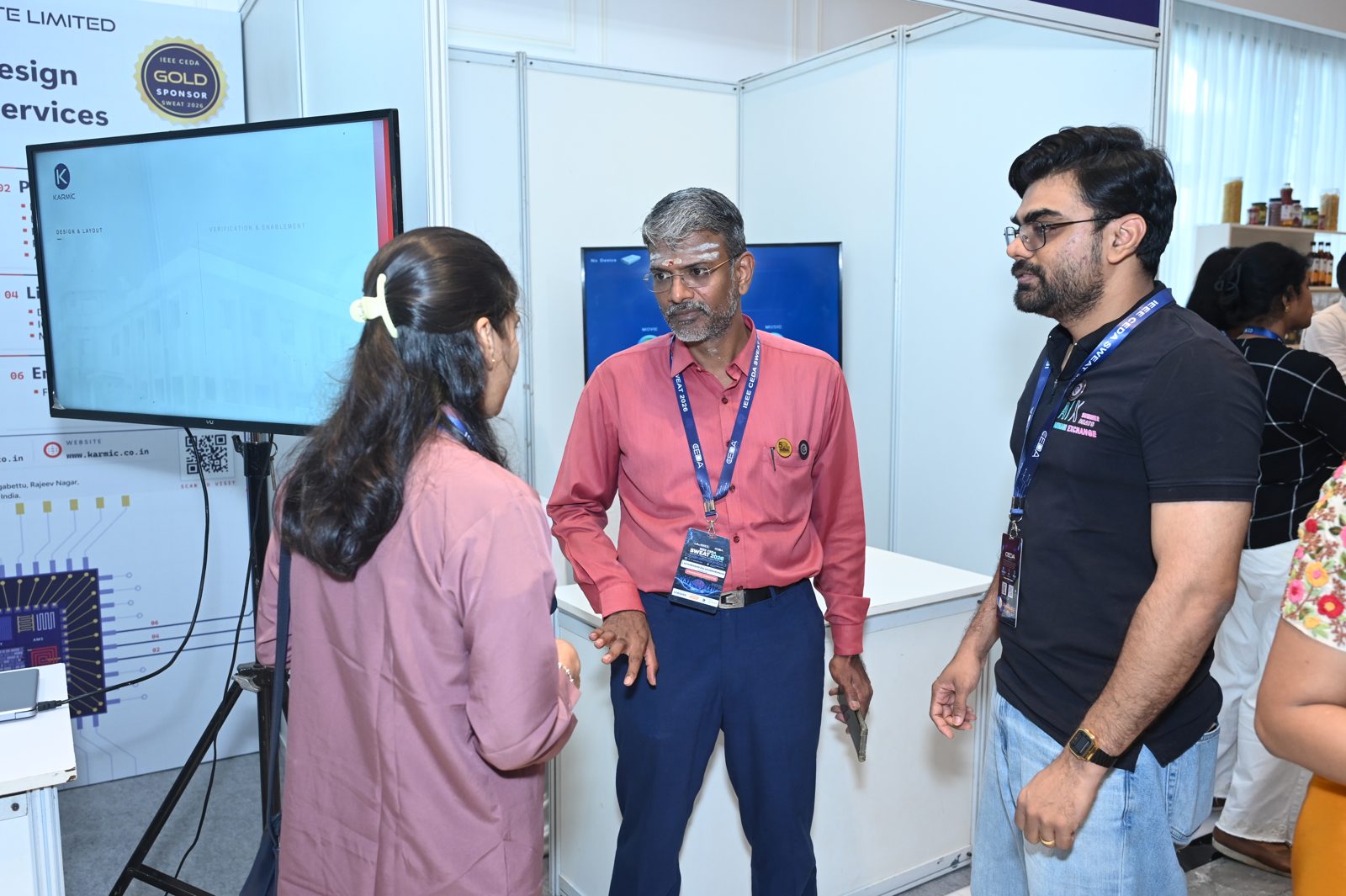 Palash Khandale in conversation on the exhibition floor at IEEE CEDA SWEAT 2026